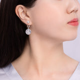 Ruyi Charm Hoop Earrings Silver with The Legendary Mulan Charm Model Image - Shen Yun Collections
