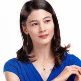 The Timeless Blessings Necklace 18kt White Gold with Sapphire Model  | Shen Yun Collections 