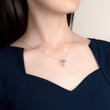The Timeless Blessings Necklace 18kt White Gold with Tanzanite and Diamond Model | Shen Yun Shop 