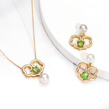 The Timeless Blessings Necklace and Earrings 18kt Yellow Gold with Tsavorite Lifestyle | Shen Yun Collections 