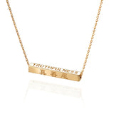 Zhen Shan Ren Elegant Virtues Necklace 14kt Yellow Gold Front Image with Chinese 真善忍 Character | Shen Yun Collections